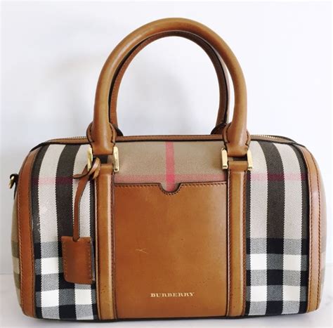 come riconoscere il bauletto burberry se è originale|Borsa contraffatta, 8 cose da sapere per distinguerla dall'originale .